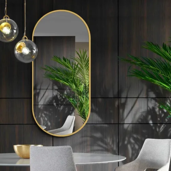 Oval mirror with gold frame